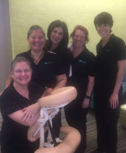 group of massage therapists who offer chair massage in maryland