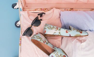 suitcase and vacation blog -Chair massage Maryland - Corporate Massage Kneads Maryland