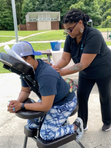 massage therapist offering chair massage therapist maryland 